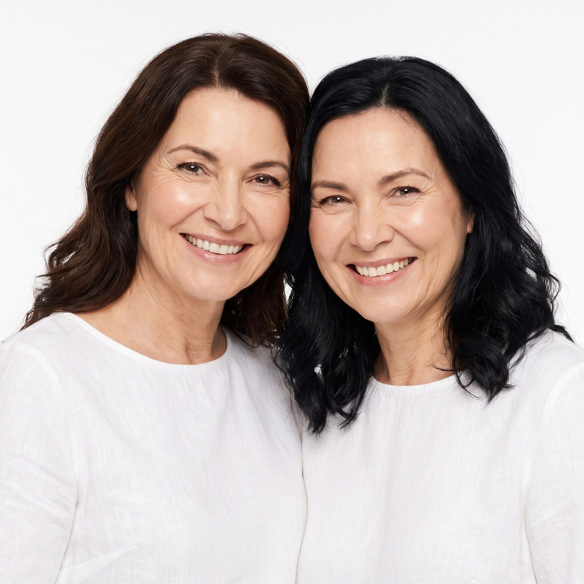 Two women smiling cheek to cheek